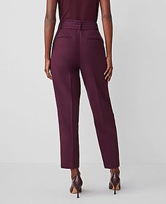 Elevate your wardrobe with the sophisticated charm of Ann Taylor's Petite Belted Taper Pants in a stunning Plum Rose hue. Perfect for the modern professional, these pants blend functionality with style.

- **Size:** Petite 8
- **Color:** Plum Rose
- **Material:** 79% Polyester, 17% Rayon, 4% Spandex
- **Gender:** Female
- **Fit:** Tailored and fitted
- **Rise:** High rise, sits 1/2" to 1" below natural waist
- **Length:** Hits at ankle, 25" inseam with 15" leg opening
- **Leg Shape:** Tapered, n Fitted Paperbag Waist Bottoms For Workwear, Fitted Bottoms With Paperbag Waist For Workwear, Fitted Paperbag Waist Pants For Workwear, Fitted Paperbag Waist Pants With Belt Loops, Office Pants With Paperbag Waist And Belt Loops, Paperbag Waist Bottoms With Belt Detail For Work, Rose Gender, Taper Pants, Blazer And Skirt