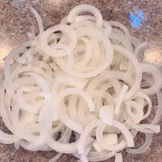 an image of sliced onions on the counter