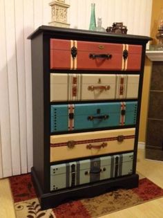 a multicolored chest of drawers in a living room