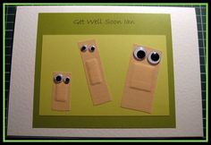 two pieces of brown paper with googly eyes on them and the words get well soon in