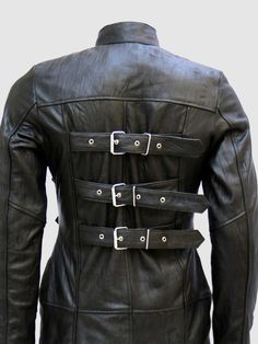 A leather coat should be two things; Durable and perfect in size. That is exactly what we are offering you with this Men's Gothic Leather Trench Coat. Best quality with great style and wonderful look. The super subtle black color is considered a favorite when it comes to leather apparel. The multiple buckles and belts at the front and on the collar are ready to give you that biker feel. The jacket comes with some amazing features to make it the perfect fit for your trendy wardrobe. You can not o Full Length Coat, Motorcycle Shop, Leather Trench, Custom Jacket, Leather Trench Coat, Fur Hood, Band Collar, Leather Jackets Women, Leather Jacket Men