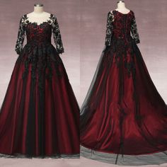 a red and black wedding dress with long sleeves, on mannequin dummys