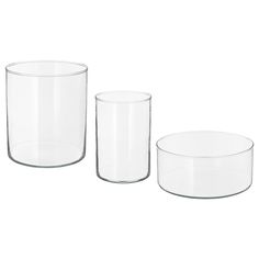 three clear glass containers are shown on a white background, one is empty and the other has no lid