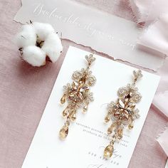 Champagne gold crystal wedding earrings for brides chandelier | Etsy Glamorous Gold Crystal Wedding Earrings, Glamorous Gold Crystal Earrings For Wedding, Sparkling Gold Crystal Earrings For Wedding, Gold Sparkling Crystal Earrings For Wedding, Gold Crystal Chandelier Earrings For Wedding, Gold Chandelier Earrings With Crystals For Wedding, Gold Crystal Earrings For Wedding, Dr Items, Champagne Gold Wedding