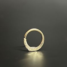 Discover our charmingly designed piercing hoop 💫, featuring a diamond-cut texture for an exquisite finish. It's the perfect accessory for septum, helix and daith piercings, adding elegance to any look. 🌟 Super comfortable and ideal for everyday wear, you'll love how it feels! 🌈 Choose from 9K, 14K, or 18K yellow, white, or rose solid gold to make it uniquely yours. Check out the options in the drop-down menu. The hoop carries the hallmark of solid gold, ensuring its quality and purity ✨. Crafted just for you! Your ring will arrive in a beautiful gift box 🎁, ready to enchant whether it's a treat for yourself or a gift for someone special. Proudly created in our cozy home studio in Rehovot, Israel 🏡, each piece of jewelry is a testament to our passion and craftsmanship. All our jewelry Gold Daith Jewelry, Helix Earrings Hoop, Daith Piercings, Gold Septum, Daith Earring, Daith Jewelry, Helix Hoop, Daith Earrings, Helix Earring