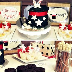 a table topped with cakes and cookies covered in frosting