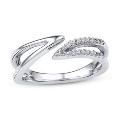 Open twists wrap around this sterling silver mid-finger ring for her, with diamond accents adding sparkle to one side. This contemporary style is designed to be worn above the middle knuckle. Open Ring With Diamond Accents, Modern Jewelry With Diamond Accents And Open Ring Design, Elegant Bypass Ring With Tension Setting, Modern Diamond Stackable Rings With Tension Setting, Modern Bypass Open Ring For Formal Occasions, Modern Open Bypass Ring For Formal Occasions, Modern Open Bypass Ring For Formal Events, Modern Stackable Diamond Rings With Tension Setting, Fine Jewelry Silver Bypass Ring With Diamond Accents