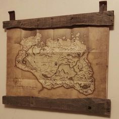 an old map is hanging on the wall