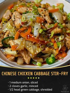 the chinese chicken cabbage stir fry is served in a white bowl with sesame seeds and carrots