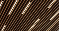 a close up view of the wooden slats on a building's roof top