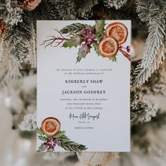 an orange slice on top of a wedding card