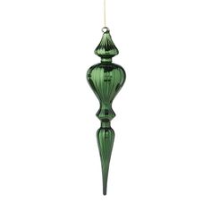 a green glass ornament hanging from a string