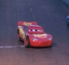 the cars are racing down the street together