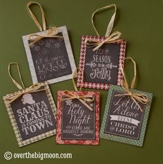 four christmas gift tags tied with twine