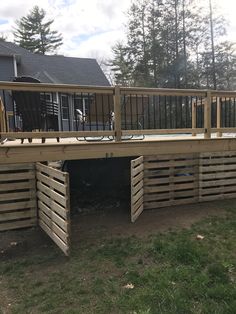 a wooden deck built into the side of a house