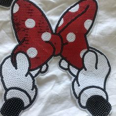 the minnie mouse bow is made out of sequins