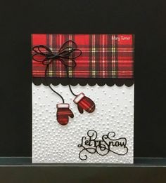 a handmade christmas card with plaid and mittens