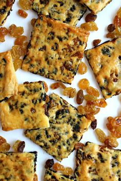 small crackers with raisins are on a plate