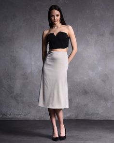 Step up your style game with this Grey Satin High-Waisted Midi Skirt, designed for women who love a touch of elegance in their wardrobe. This sleek and sophisticated satin skirt is perfect for cocktail parties, evening events, or any special occasion where you want to stand out. Its high-waisted design and luxurious fabric create a flattering silhouette, making it a must-have for your formal wardrobe. 💫 🌟 Unique Features: 👠 High-Waisted Design: Cinches at the waist to create a flattering and Skirts Midi High Waisted, Satin Midi Skirt, Skirt For Women, Cocktail Parties, Midi Length Skirts, Unique Features, Satin Skirt, Formal Looks, Tailored Jacket