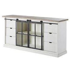 an entertainment center with drawers and sliding doors