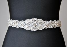 "Sophisticated and elegant bridal bridesmaid , dress sash belt.  This is unique luxury bridal belt with large rhinestone crystal applique. Fully encrusted with silver large crystals and beads attached to double side satin ribbon. It will look great with any color dress, being either white, diamond, ivory, or antique.  Looks great in the front , or on the side ! Made of  - lovely stunning design applique decorated with tiny silver glass beads and crystal rhinestones in different sizes - or 34.5\" Dress Sash Belt, Wedding Dress Sash Belt, Belt Wedding Dress, Dresses Corset, Bridesmaid Belt, Gown Rental, Bridal Belts, Belt Luxury, Dresses Hijab