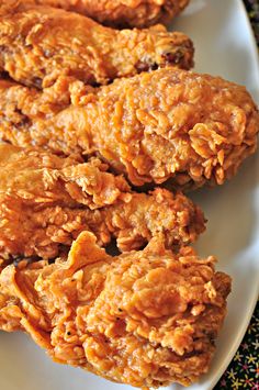 some fried food is on a white plate