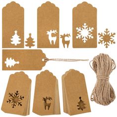 christmas gift tags and twine with reindeer, snowflakes and pine tree cutouts