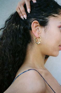 Note:     resembling the movement of liquid in solid form. these hoops are made from solid 18 kt gold-plated brass. weighted but comfortable. handmade in new york. sold as a set. Womens Wear Daily, V Magazine, July 2022, Behind Ear Tattoo, Pre Order, Gold Earrings, Hoop Earrings, Plating, Women Wear