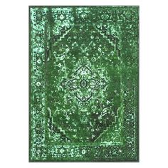 a green rug with an intricate design on the top and bottom, in front of a white background