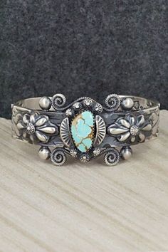 (eBay) Find many great new & used options and get the best deals for Turquoise & Sterling Silver Bracelet - Andrew Gordon at the best online prices at eBay! Free shipping for many products! Classic Handmade Turquoise Bracelets, Luxury Handmade Turquoise Bracelets, Luxury Turquoise Engraved Jewelry, Luxury Handmade Turquoise Bracelet, Luxury Engraved Turquoise Jewelry, Classic Turquoise Adjustable Bracelet, Classic Handmade Cuff Bracelet Collectible, Classic Turquoise Cuff Bracelet Gift, Navajo Bracelet