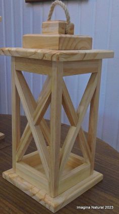 a small wooden box sitting on top of a table