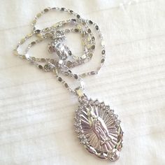 Silver Tone. 19". New In Plastic Pouch. Silver Virgin Mary Necklace, Silver Bling Jewelry, Mary Necklace, Silver Jewlery, Virgin Mary Necklace, Plastic Pouch, Silver Rhinestone, Dream Jewelry, Virgin Mary