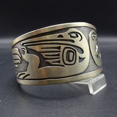 "VINTAGE KABANA BRACELET DESCRIPTION: This handsome bracelet is a vintage piece from Kabana, makers of fine southwestern jewelry since 1975. Images from the Pacific Northwest grace this heavy gauge sterling silver cuff. This bracelet will be a treasured addition to your collection of fine vintage Southwestern jewelry. MEASUREMENTS: Interior of the cuff measures 5 3/4\" with an additional 1 3/8\" non-adjustable gap. Total circumference: 7 1/8\" Measures 2 1/2\" straight across the widest part of Jewelry Measurements, Bones Bracelet, Turquoise Bracelet Cuff, Southwestern Jewelry, Turquoise Cuff, The Pacific Northwest, Gorgeous Bracelet, Coral Turquoise, Denver Co