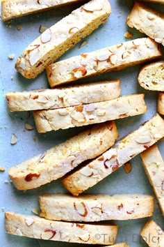 several pieces of bread with almonds on top