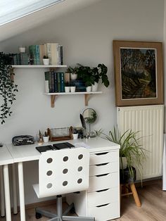 a white desk and chair in a room