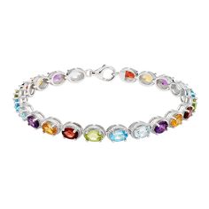 Complement your favorite outfits with this colorful sterling silver and gemstone bracelet. Complement your favorite outfits with this colorful sterling silver and gemstone bracelet.Click on this JEWELRY & WATCHES GUIDE to learn about fit, styles, materials and more! Length: 7 in. Clasp: lobster claw Nickel free Metal: sterling silver Plating: rhodium Finish: polished Packaging: boxedSTONE DETAILS Stone type: Swiss blue topaz, peridot, onyx, lab-created sapphire, amethyst, blue topaz, Swiss blue topaz, citrine, garnet, peridot Stone size: 6 mm x 4 mm Shape: oval Setting: prong Size: 7.25". Color: Multicolor. Gender: female. Age Group: adult. Oval Setting, Peridot Stone, Swiss Blue Topaz, Tennis Bracelet, Gemstone Bracelet, Lobster Claw, Blue Topaz, Citrine, Garnet