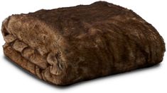 a large brown fur blanket on top of a white surface