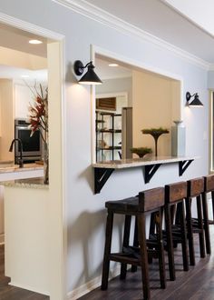 the kitchen is clean and ready to be used as a dining room or living room