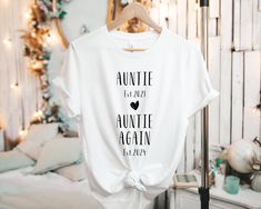 a white t - shirt with the words annite and an anttie againn printed on it