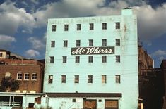 an old building with the word mr whirrs painted on it