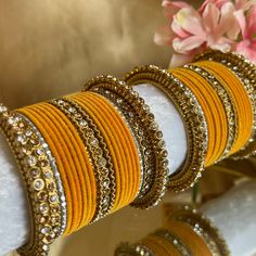 This includes 2 half stacks  Gold and mustard with velvet bangles , limited edition in 2.6 only ✨ Ready to ship 📦 Luxury Yellow Bangle For Wedding, Luxury Hallmarked Bangle For Festivals, Luxury Hallmarked Fusion Bangle, Luxury Handmade Bangle For Festive Season, Luxury Multicolor Jubilee Bracelet Bangle, Luxury Handmade Bangle For Festive Occasions, Velvet Bangles, The Bangles, Wedding Jewelry Earrings