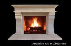 a fireplace with a fire burning in it