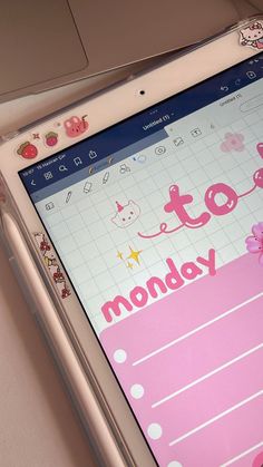 an ipad with hello kitty stickers on the screen