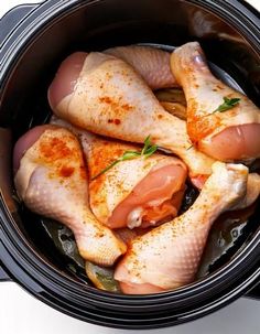 raw chicken in the crock pot ready to cook