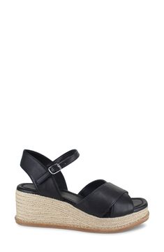 Wide straps crisscross over the vamp of an espadrille-inspired sandal lofted by a jute-wrapped platform and integrated wedge heel. 2" heel Adjustable ankle strap with buckle closure Cushioned footbed Leather upper/synthetic lining and sole Imported Straw Sandals With Heel Strap And Round Toe, Black Closed Toe Straw Sandals, Black Straw Wedge Heel Espadrilles, Espadrille Sandals With Woven Sole And Wedge Heel, Black Ankle Strap Sandals In Straw, Straw Wedge Sandals With Ankle Strap, Open Toe Espadrille Wedge Sandals With Wrapped Heel, Open Toe Straw Wedge Sandals With Heel Strap, Espadrille Wedge Sandals With Wrapped Heel And Open Toe