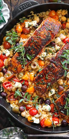 Mediterranean Salmon & Rice with Chickpeas, Cherry Tomatoes, Olives, Lemon, Oregano, and Feta Cheese - in a cast iron skillet. Mediterranean Salmon, Fish Dinner Recipes, Meat And Vegetables, Salmon And Rice, Salmon Dinner