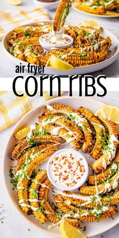 corn on the cob is being drizzled with white sauce and garnished with parsley