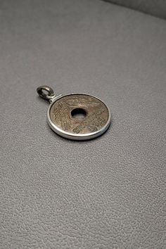 oxidized silver cast antique hole coin pendant with silver vessel Silver Gold Jewelry, Tarnished Jewelry, Bronze Jewelry, Clear Nails, Oxidized Silver, Hand Jewelry, Coin Pendant, Brass Jewelry, Cleaning Jewelry