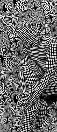 an abstract black and white pattern with distorted shapes in the center, as if it were optical art