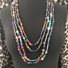 ON SALE Very nice huge statement for Strand long glass beaded statement necklace in very good vintage condition. Measures 30 inches long. Perfect for any outfit, collection and sure to become a favorite. Vintage Multicolor Multi-strand Beads, Vintage Multi-strand Colorful Beaded Necklaces, Vintage Multi-strand Beaded Necklaces With Colorful Beads, Vintage Multi-strand Beaded Necklace With Colorful Beads, Vintage Multicolor Faceted Beads Necklace, Multicolor Glass Costume Jewelry Necklaces, Unique Long Beaded Necklace With Faceted Beads, Multicolor Glass Costume Jewelry Necklace, Multicolor Glass Beaded Necklaces With Large Beads